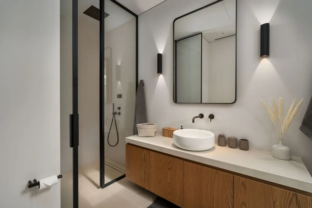 Bathroom with twin basins and timber vanity